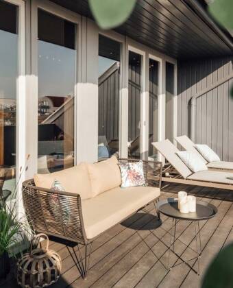 I tillegg til en terrasse med utsikt over torget, har hotellet også en takterrasse for en perfekt pause fra bylivet.