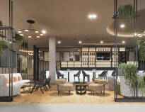 The modern restaurant and the cosy lounge-bar are the centerpiece of the hotel.