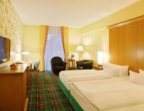 The spacious and comfortably furnished rooms invite you to stay.