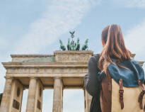 Discover Berlin with its countless sights like the Brandenburg Gate.