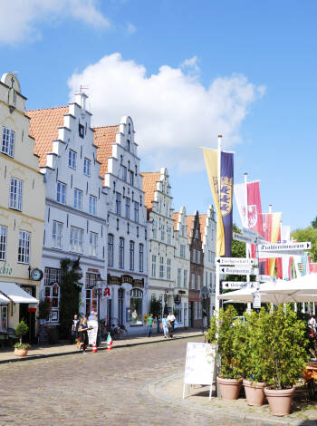 Friedrichstadt with its special houses and all the canals is worth a visit.