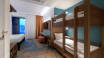 Large rooms with a bunk bed are offered for families.
