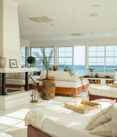 Lido Club & Spa is the heart of Ystad Saltsjöbad—a Pool Club where warm indoor and outdoor pools, gentle music, and refreshing drinks set the tone for pure relaxation.
