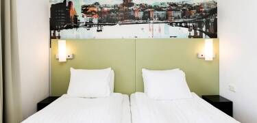 The rooms offer practical amenities and smart use of space.
