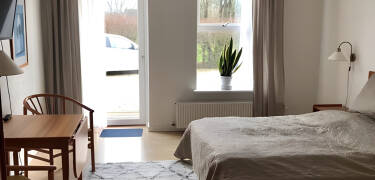 Rommene på Børglum Mejeri Hotel - B&B er gjennomtenkt designet for å være enkle, men fullt utstyrt med alle nødvendige fasiliteter.
