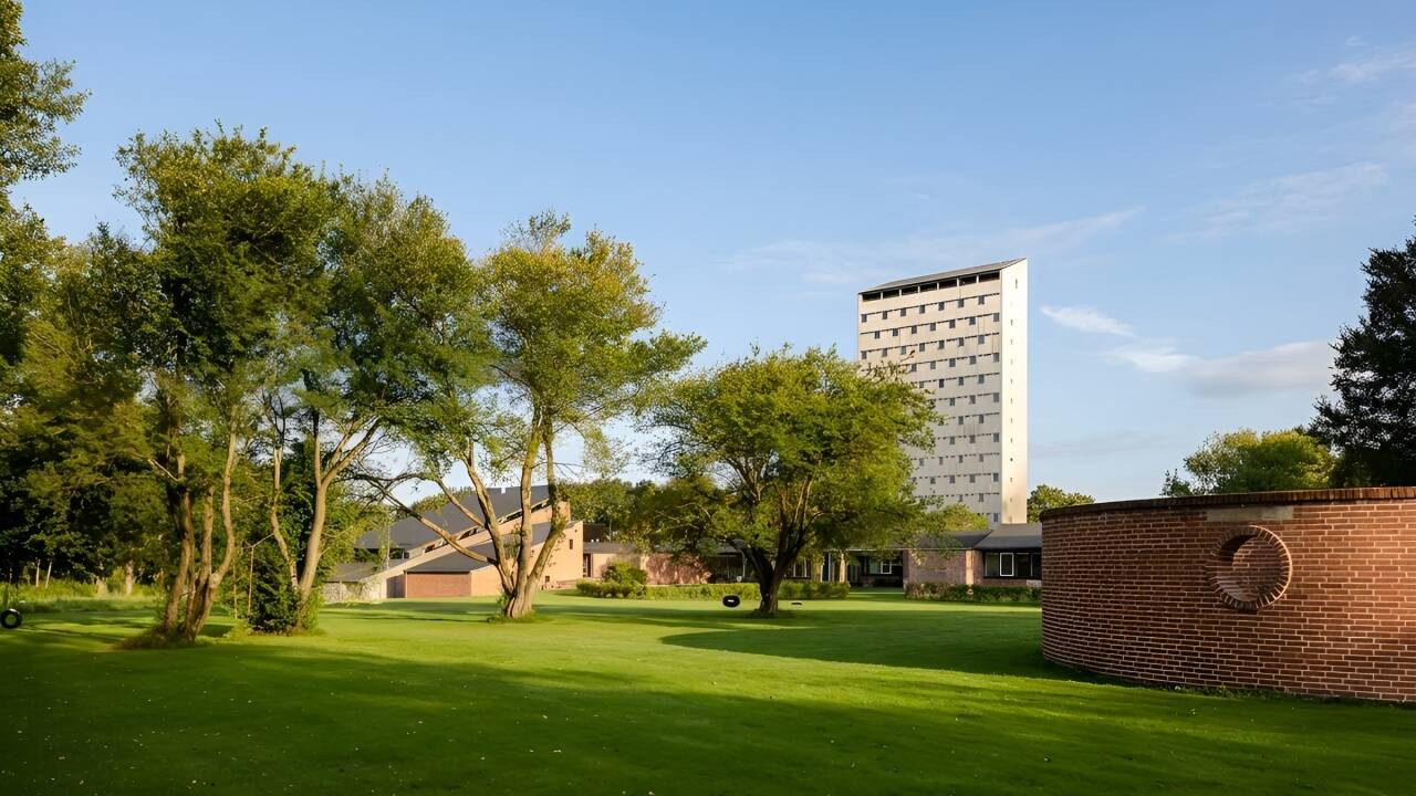 Stay in a heritage-listed former folk high school showcasing iconic Danish 1960s architecture and original design details.