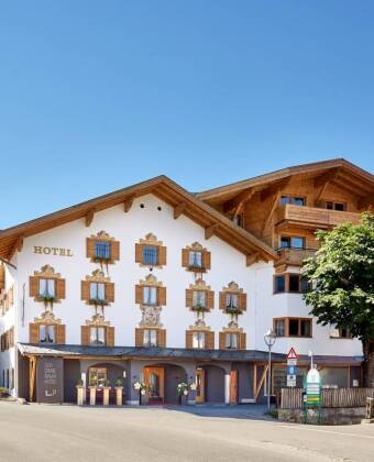 The hotel’s traditional alpine style and modern design create perfect harmony within the mountain setting.