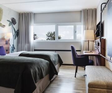 Geschmackvoll eingerichtete Zimmer sorgen dafür, dass Sie sich wie zu Hause fühlen