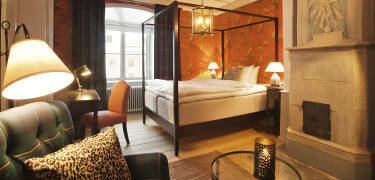 Stay in rooms filled with rich historic charm and a calm castle atmosphere.
