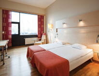 The hotel offers spacious, bright rooms.
