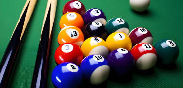 You can challenge each other in the hotel's billiards room.