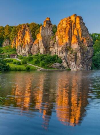 Take a tour to see the famous rock formation Externsteine in the Teutoburg Forest.