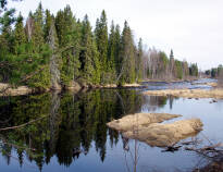 The area is surrounded by forests, lakes, and rivers, offering picturesque natural scenery.