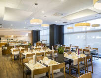 The hotel restaurant serves breakfast, lunch and dinner, light snacks and a wide selection of drinks.