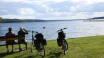 Summer days are perfect for outdoor activities like biking, trekking, fishing, rowing, and various water sports on Lake Mjøsa.