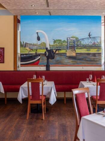 Genießen Sie frische internationale und regionale Gerichte im exquisiten Restaurant des Hotels.