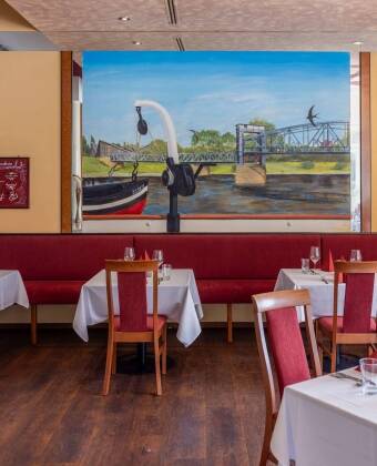 Genießen Sie frische internationale und regionale Gerichte im exquisiten Restaurant des Hotels.