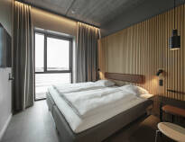 Sov i vakkert designede rom med en koselig og innbydende atmosfære.