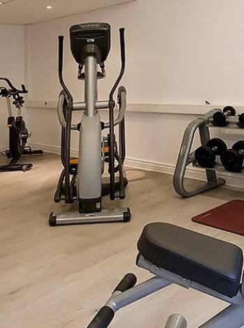 Recharge in the wellness area featuring a sauna, gym, and calming spa spaces.