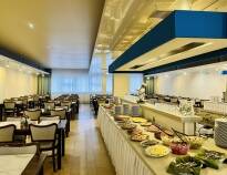 Savour a rich buffet breakfast and dinner in the on-site restaurant.