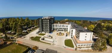 Bo på et moderne hotel i hjertet af livlige Mielno
