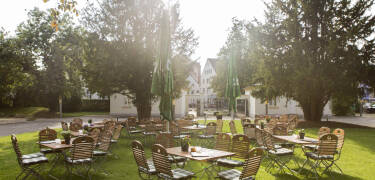 Hotelhaven er det perfekte sted at slappe af i grønne omgivelser.