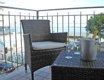 Enjoy the view with a cold refreshment on the hotel's cosy terrace.