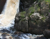 See the "Danish Waterfall" and the Kongestenen with a short trip to the beautiful nature area 'Simlångsdalen'.