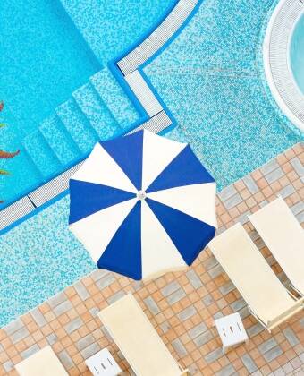 Unwind in the spa with indoor and outdoor pools, a spa tub, and relaxing treatments.