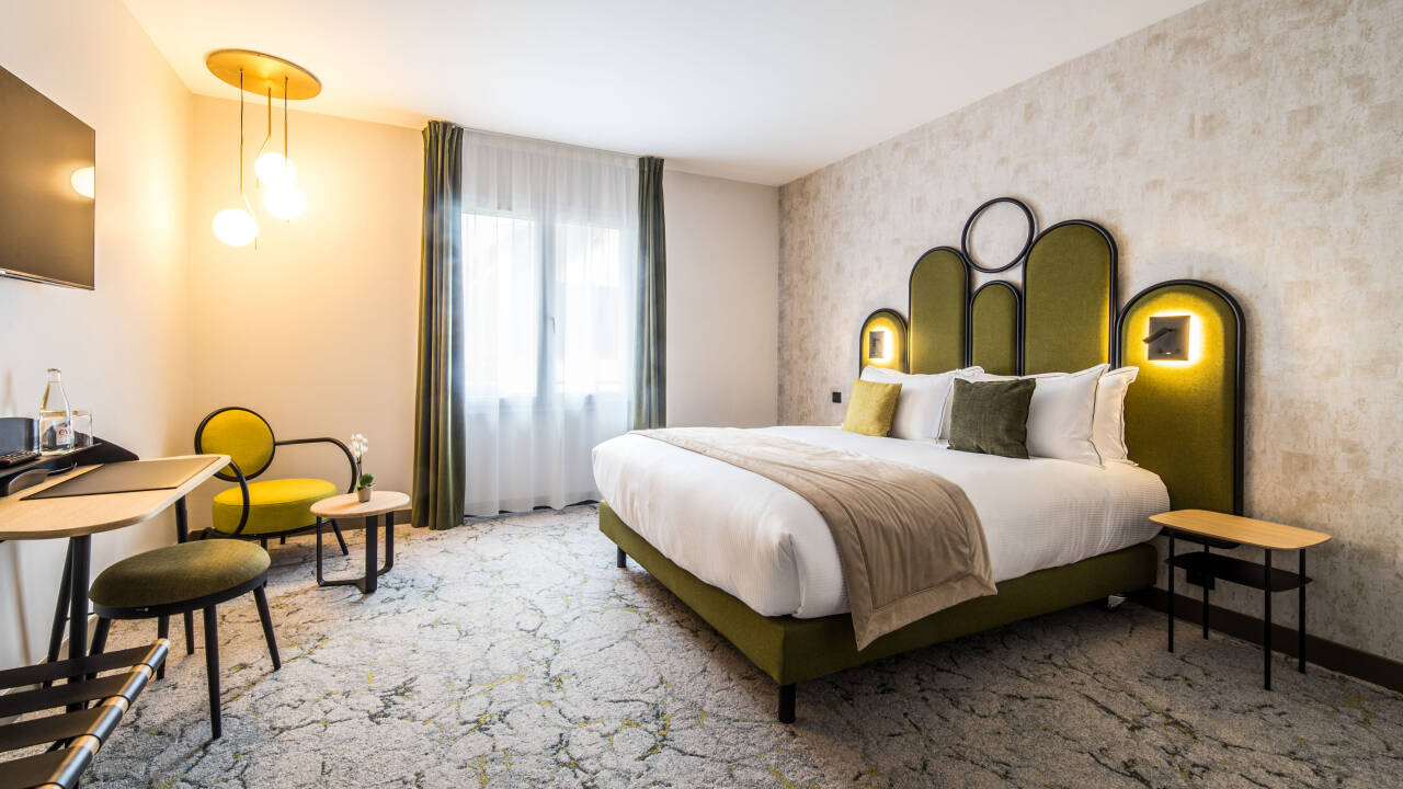 Relax in comfortable, modern, and well-equipped rooms designed for a restful stay, offering a peaceful atmosphere for complete relaxation.
