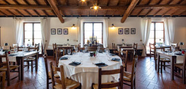 Genießen Sie umbrische Spezialitäten im Restaurant Osteria Di Vin Porcello.