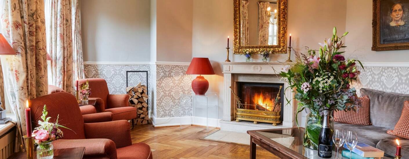 Enjoy the evening by the open fire with a refreshing drink.