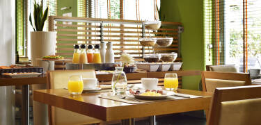 Dine at the stylish on-site restaurant with gluten-free and vegetarian options.