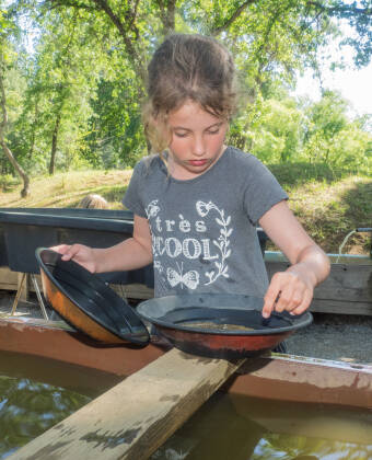 Experience the unique thrill of gold panning at Heiligenblut’s Goldgräberdorf.
