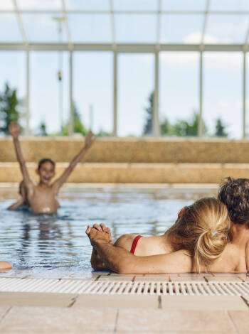 Rejuvenate in a pool filled with natural Pohorje water at the WellNest Spa of the resort.