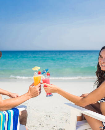 Enjoy direct access to a private beach equipped with sun loungers, umbrellas, and VIP services.