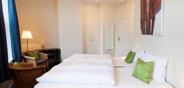 Hotellets værelser er indrettet med sans for både komfort og stil.