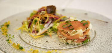 Savor inventive French cuisine in a charming Alsatian woodwork dining room.