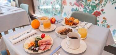 Start the day with a delicious breakfast buffet offering a variety of options.