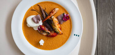 Lassen Sie den Tag mit einem köstlichen italienischen Abendessen im Hotelrestaurant ausklingen – bereits im Paket enthalten.