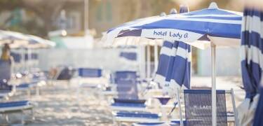 Steps from the sea with direct access to a private sandy beach.
