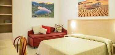 Air-conditioned rooms with balconies, Wi-Fi, satellite TV, and sleek bathrooms.