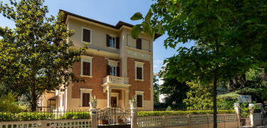 Stay in an elegant historic villa where boutique charm meets contemporary comfort and refined design.