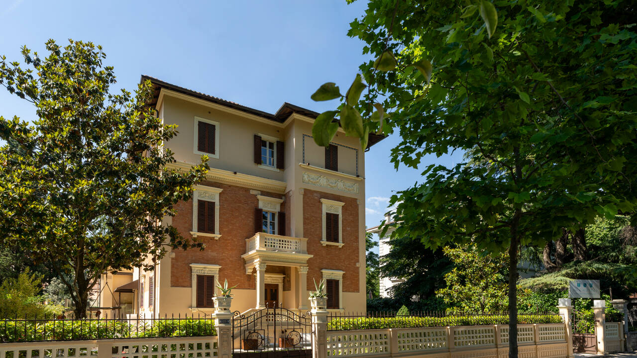 Stay in an elegant historic villa where boutique charm meets contemporary comfort and refined design.