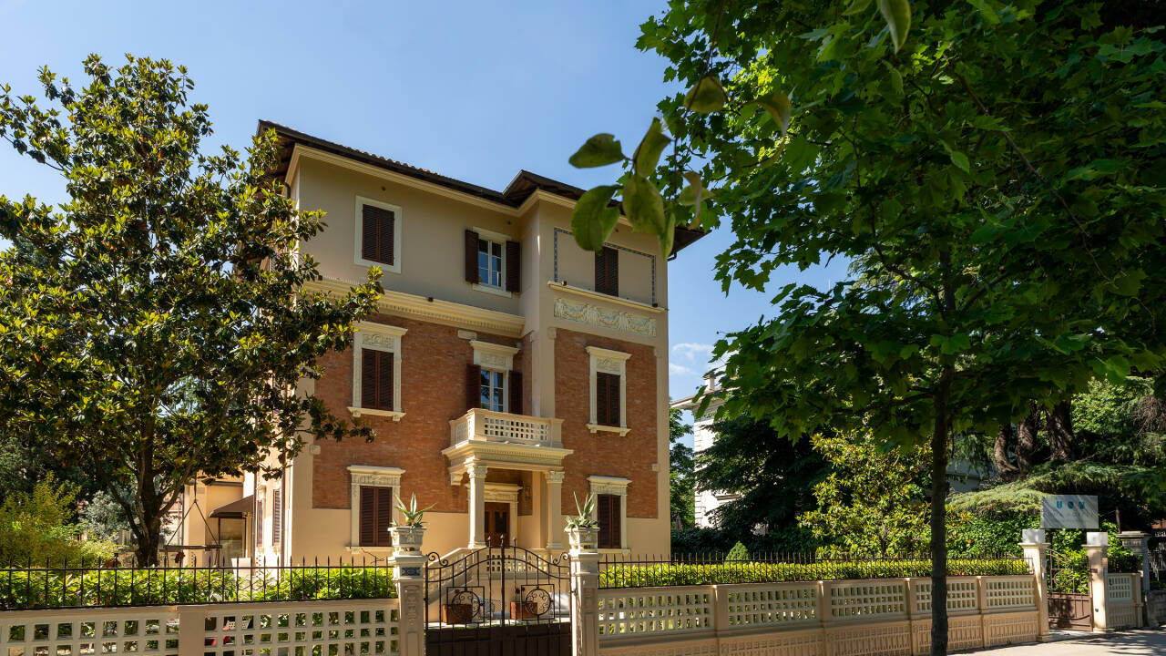 Stay in an elegant historic villa where boutique charm meets contemporary comfort and refined design.