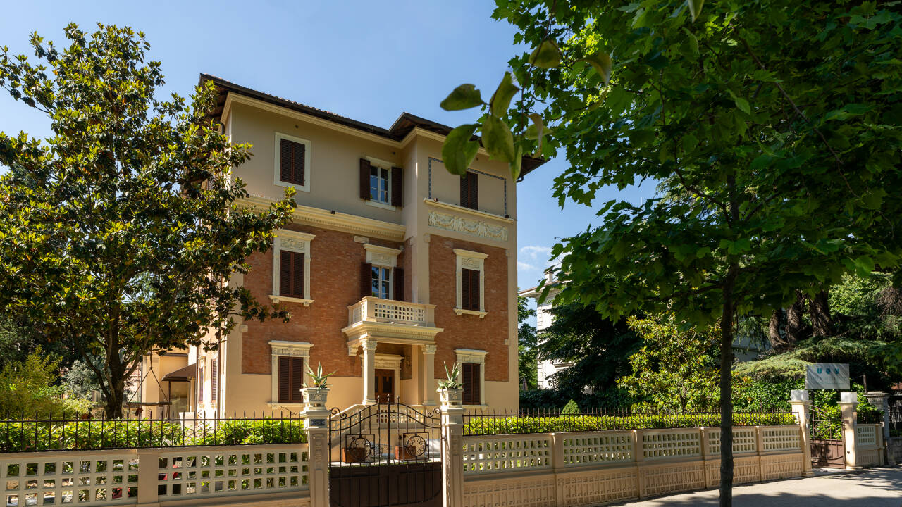 Stay in an elegant historic villa where boutique charm meets contemporary comfort and refined design.