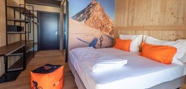 You can relax in cozy and comfortable rooms designed with natural materials and modern touches.