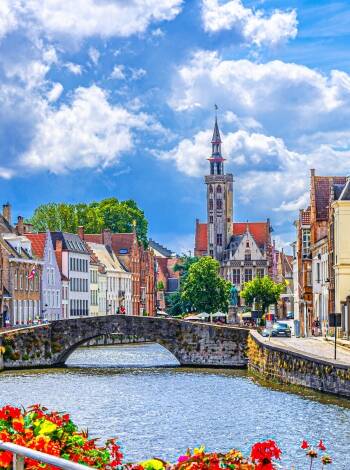 Visit the fairy tale town of Bruges. Or take the coastal tram from De Haan to reach seaside towns like Ostend.