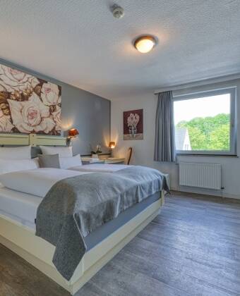 Charming rooms with comfortable furnishings and views of the lake or forest.