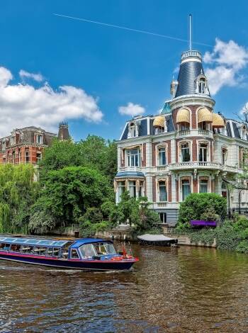 Take a canal cruise or rent a bike to see Amsterdam from a different perspective and at your own pace.